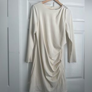 Off White form fitting dress with rhinestone buttons near shoulder🤗